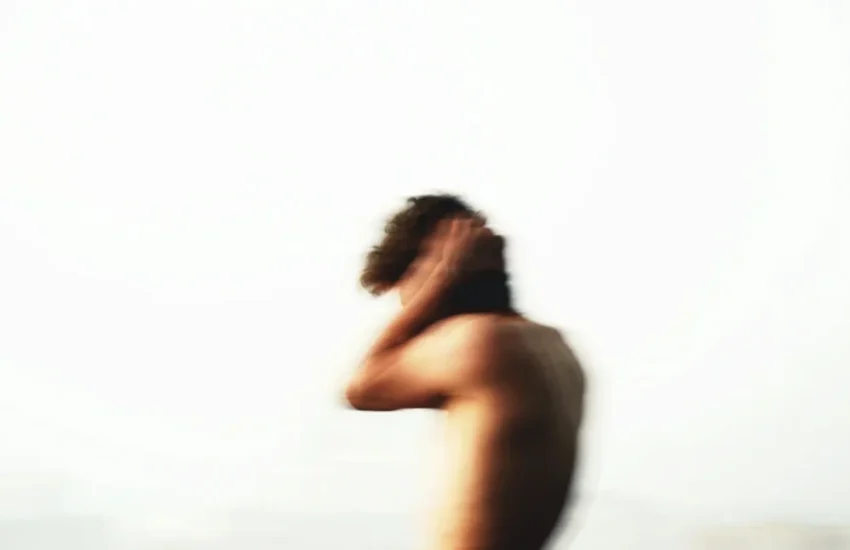 Man silencing the noise.