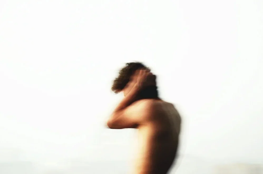 Man silencing the noise.